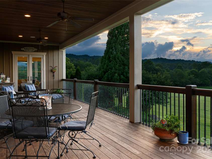 280 Walnut Hollow Road, Brevard, NC 28712.  MLS# CAR4235278, YatesRealty ID 2491. Surreal mountain views off the covered back deck