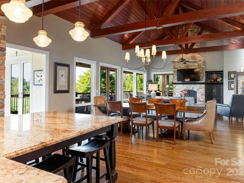 280 Walnut Hollow Road, Brevard, NC 28712.  MLS# CAR4235278, YatesRealty ID 2491. The kitchen flows seamlessly into the dining room