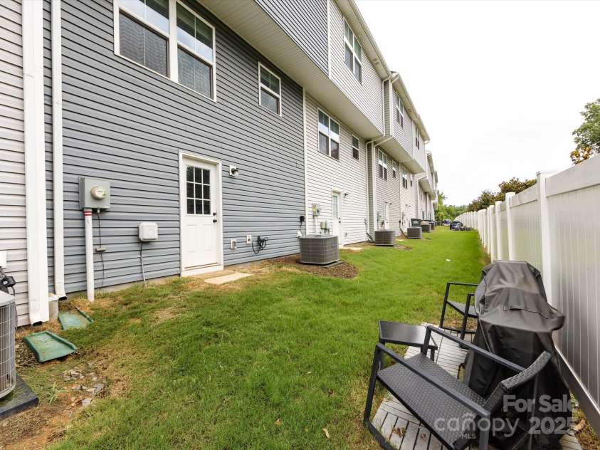 2059 Langer Street, Charlotte, NC 28214.  MLS# CAR4277986, YatesRealty ID 24913. Back Exterior