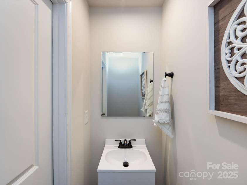 2059 Langer Street, Charlotte, NC 28214.  MLS# CAR4277986, YatesRealty ID 24913. Powder Room