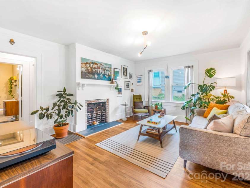 711 Reed Street, Asheville, NC 28803.  MLS# CAR4276231, YatesRealty ID 24914. Living room with beautiful 1920's architectural details