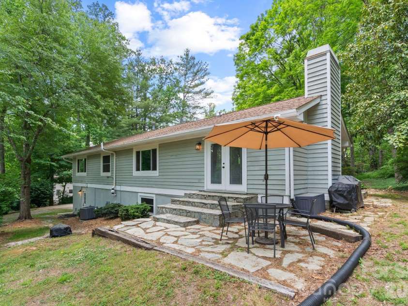 16 Chipping Green Drive, Arden, NC 28704.  MLS# CAR4382269, YatesRealty ID 24915. Back porch