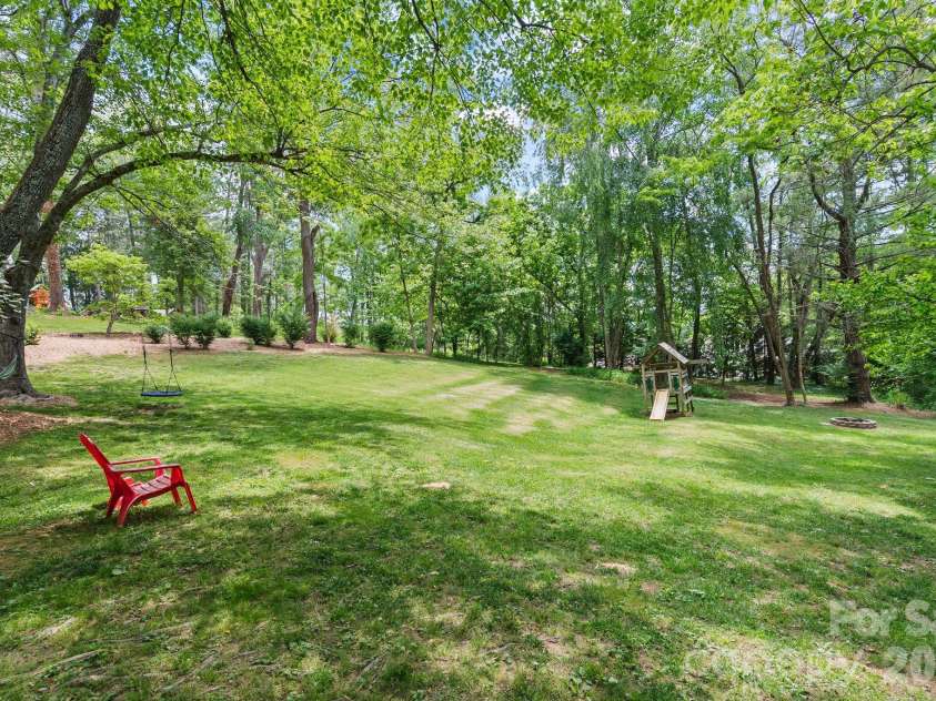 16 Chipping Green Drive, Arden, NC 28704.  MLS# CAR4382269, YatesRealty ID 24915. Backyard