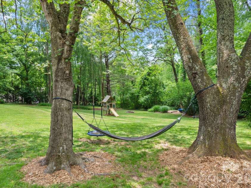 16 Chipping Green Drive, Arden, NC 28704.  MLS# CAR4382269, YatesRealty ID 24915. Backyard