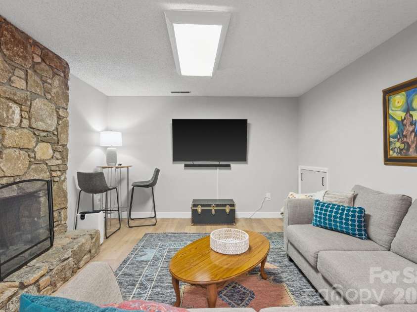 16 Chipping Green Drive, Arden, NC 28704.  MLS# CAR4382269, YatesRealty ID 24915. Den (Lower Level)