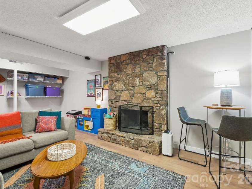 16 Chipping Green Drive, Arden, NC 28704.  MLS# CAR4382269, YatesRealty ID 24915. Den (Lower Level)