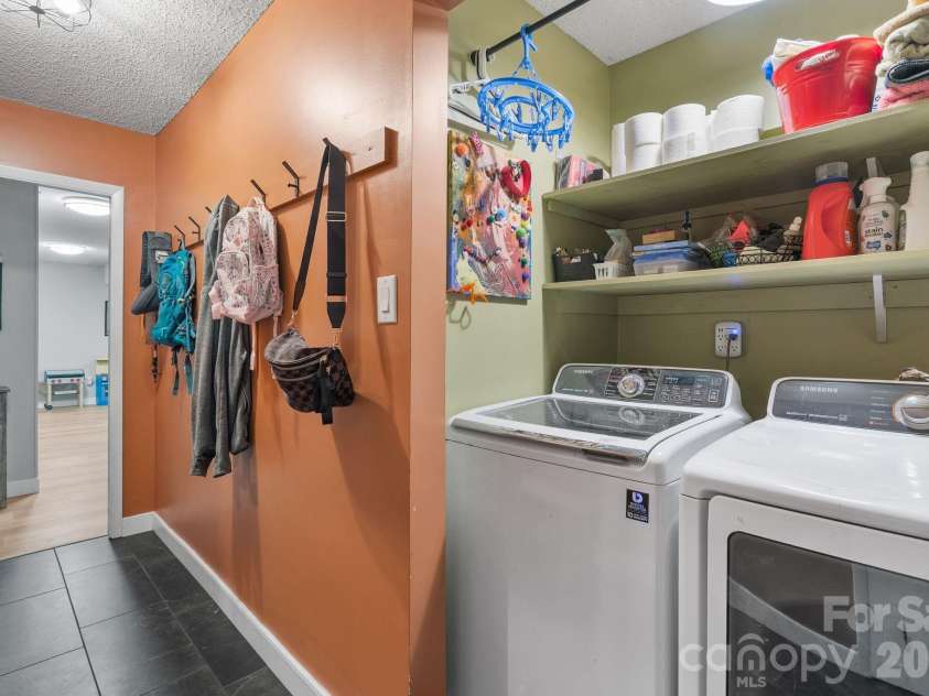 16 Chipping Green Drive, Arden, NC 28704.  MLS# CAR4382269, YatesRealty ID 24915. Mudroom/Laundry Room (Lower Level)