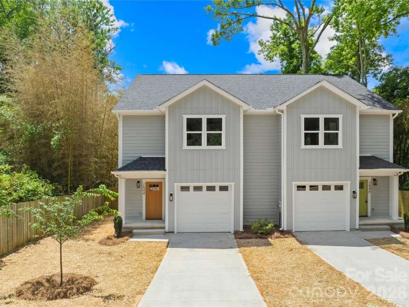 1944 Purser Drive, Charlotte, NC 28215.  MLS# CAR4378594, YatesRealty ID 24916. Modern duet-style townhome