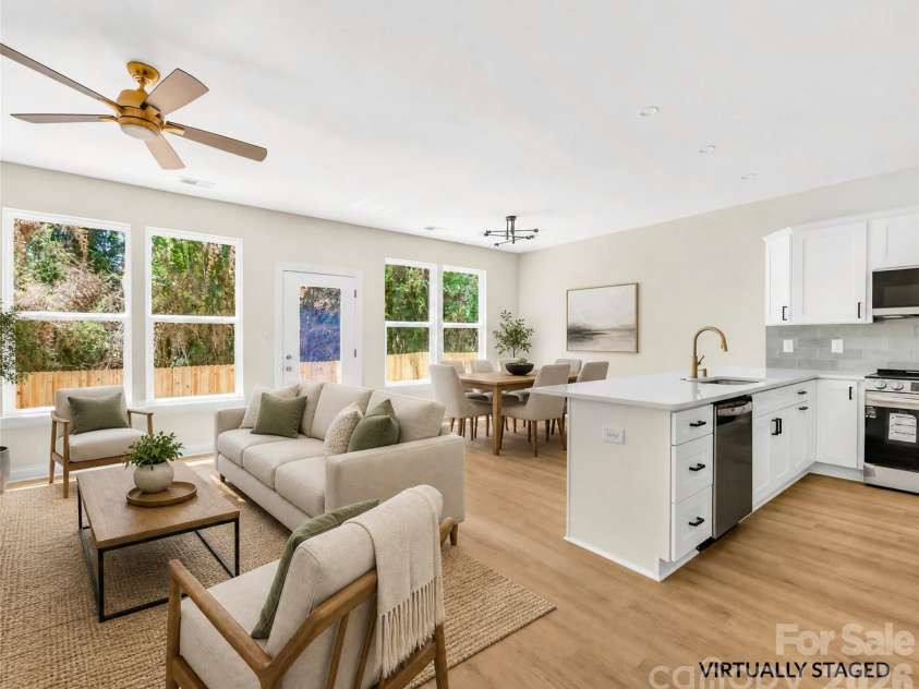 1944 Purser Drive, Charlotte, NC 28215.  MLS# CAR4378594, YatesRealty ID 24916. Open living, dining & kitchen virtually staged