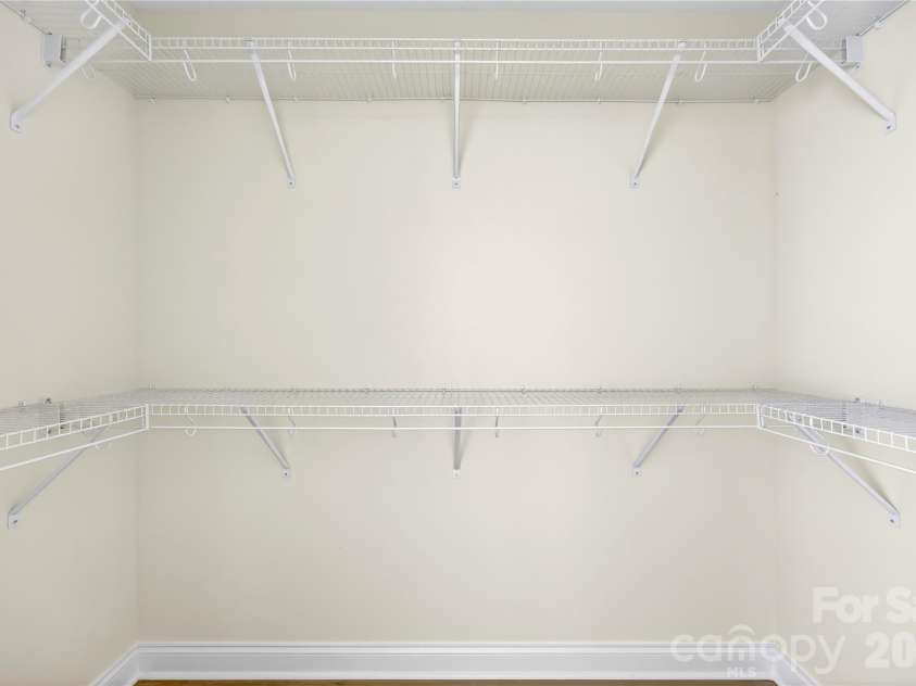 1944 Purser Drive, Charlotte, NC 28215.  MLS# CAR4378594, YatesRealty ID 24916. Walk in closet in Primary