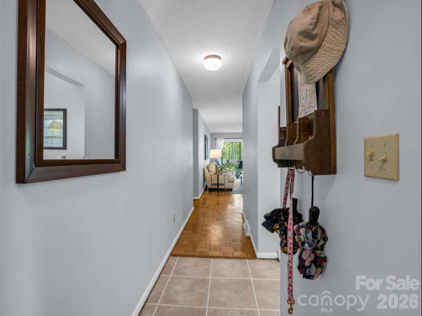 68 Lakeview Court, Brevard, NC 28712.  MLS# CAR4377140, YatesRealty ID 24920. Hallway into unit