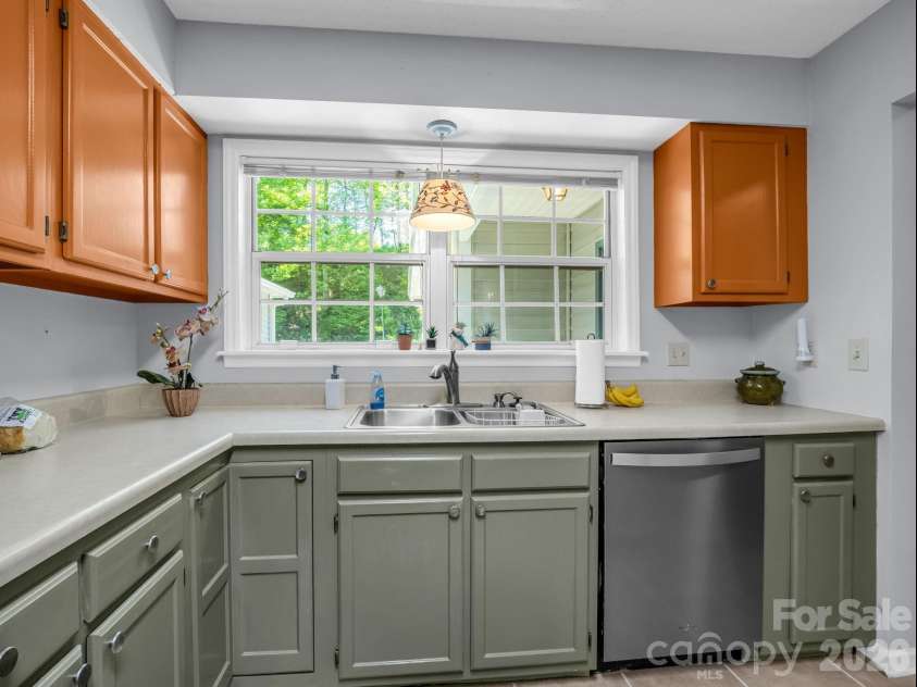 68 Lakeview Court, Brevard, NC 28712.  MLS# CAR4377140, YatesRealty ID 24920. Kitchen window street view