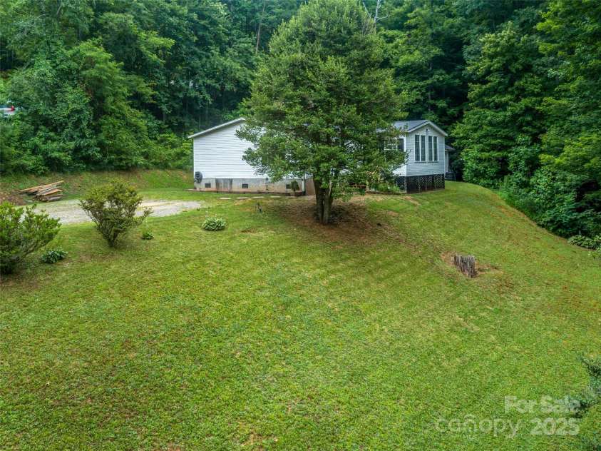 398 Normcol Drive, Pisgah Forest, NC 28768.  MLS# CAR4278329, YatesRealty ID 24923. 