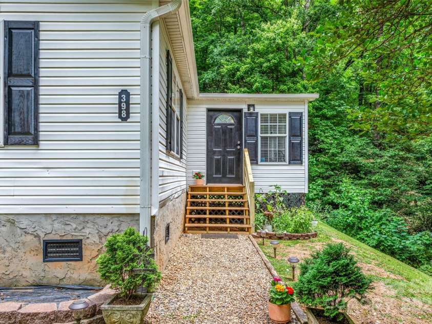 398 Normcol Drive, Pisgah Forest, NC 28768.  MLS# CAR4278329, YatesRealty ID 24923. 