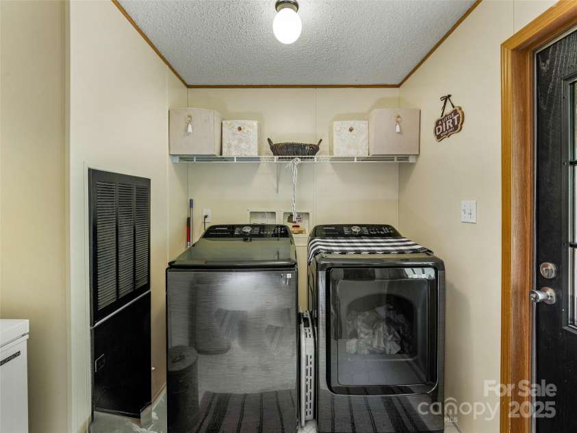 398 Normcol Drive, Pisgah Forest, NC 28768.  MLS# CAR4278329, YatesRealty ID 24923. 