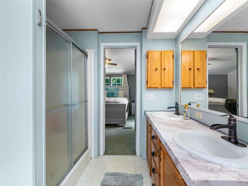 398 Normcol Drive, Pisgah Forest, NC 28768.  MLS# CAR4278329, YatesRealty ID 24923. 