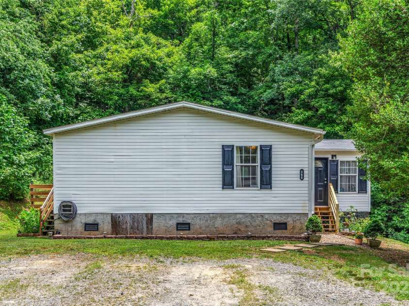 398 Normcol Drive, Pisgah Forest, NC 28768.  MLS# CAR4278329, YatesRealty ID 24923. 