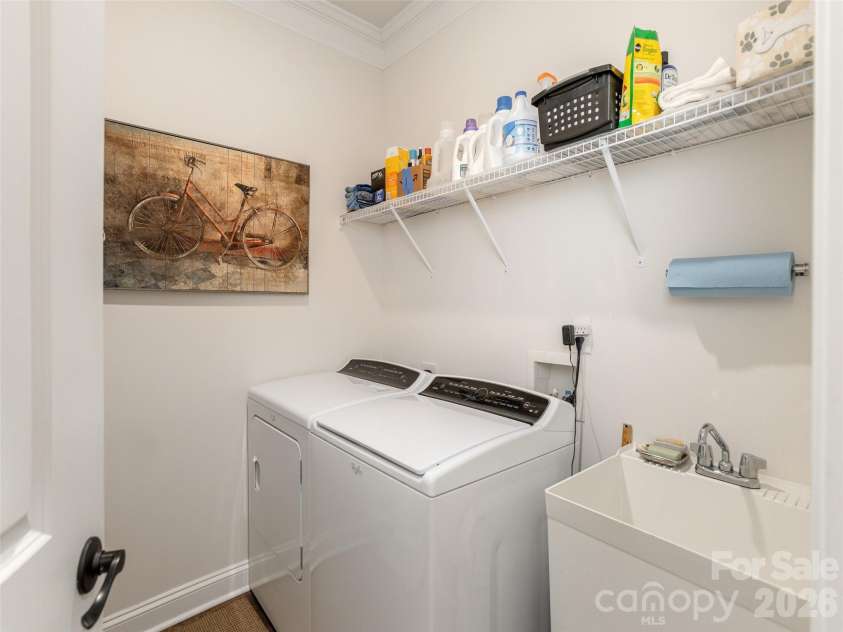 743 Summerfield Place, Flat Rock, NC 28731.  MLS# CAR4384788, YatesRealty ID 24924. Laundry Room with Sink