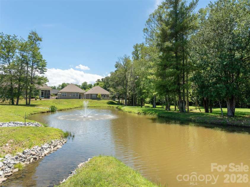 743 Summerfield Place, Flat Rock, NC 28731.  MLS# CAR4384788, YatesRealty ID 24924. Pond