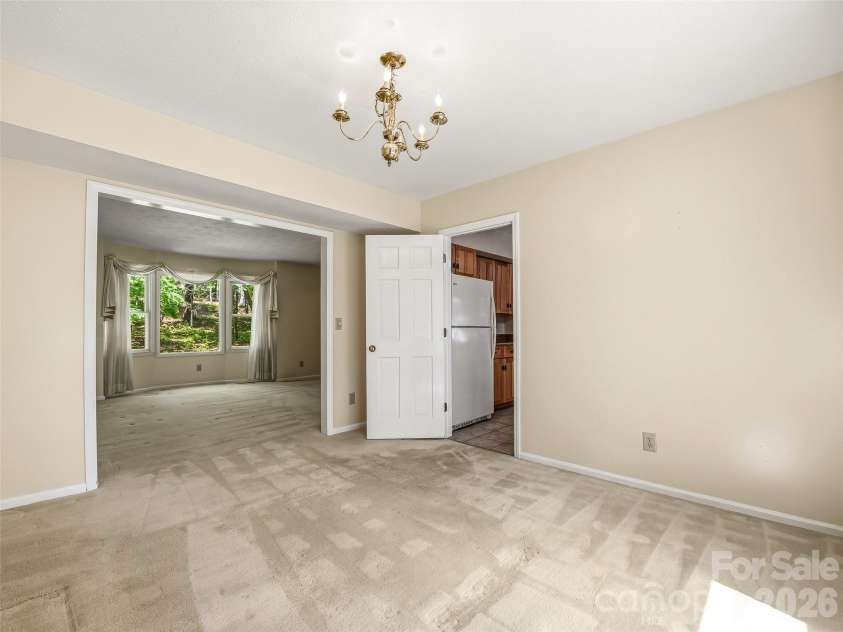 11 Woodmere Drive, Arden, NC 28704.  MLS# CAR4382384, YatesRealty ID 24926. Dining room.