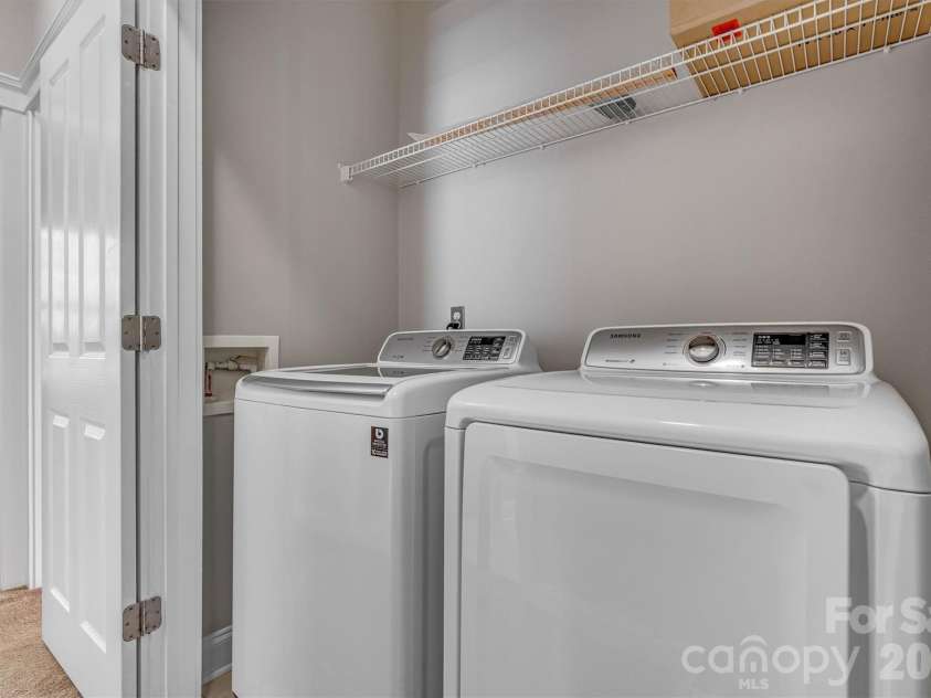 6747 Douglas Park Drive, Huntersville, NC 28078.  MLS# CAR4370341, YatesRealty ID 24932. Laundry Main Floor
