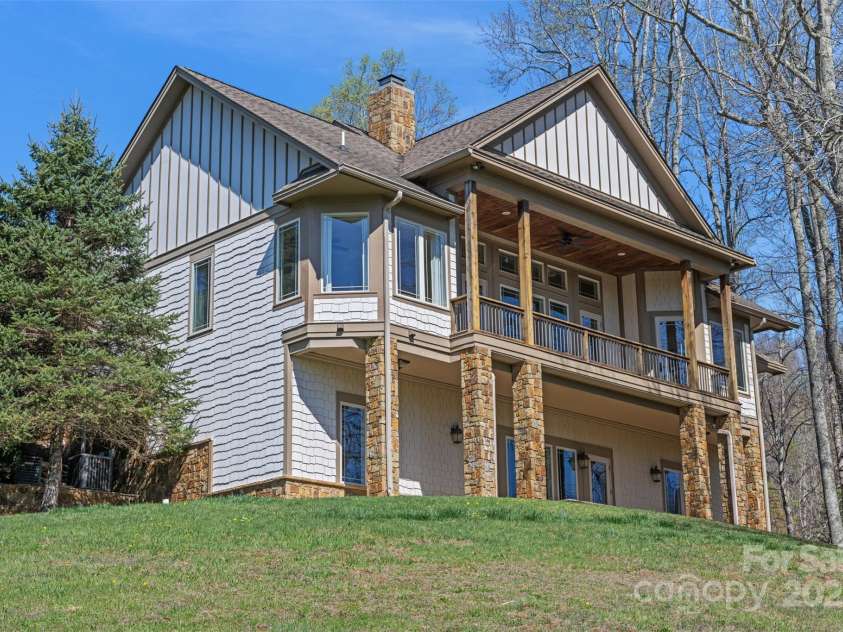 46 Ridge Lane, Linville, NC 28657.  MLS# CAR4276749, YatesRealty ID 24940. Back exterior of house