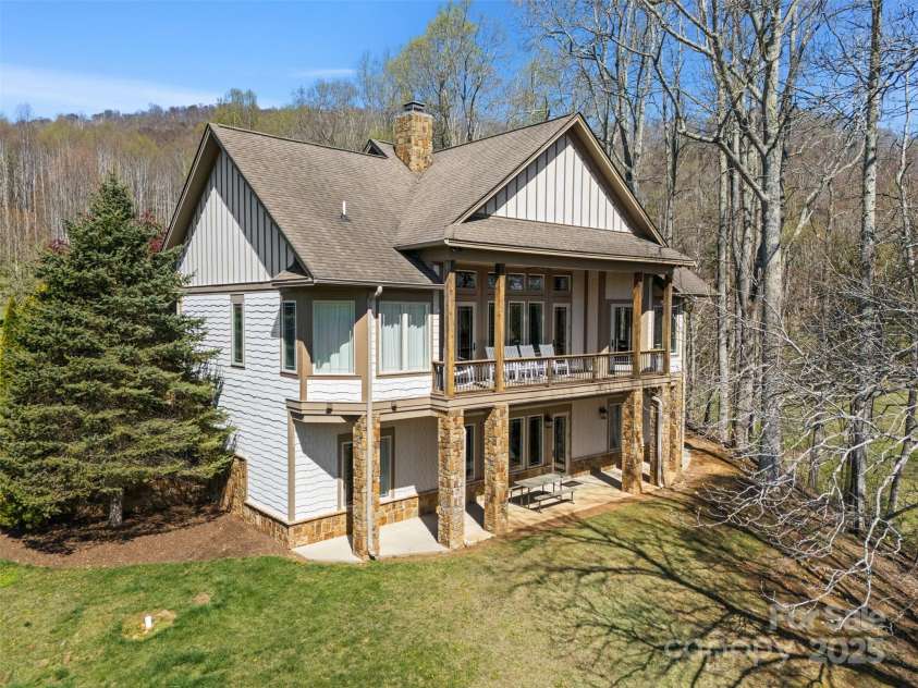46 Ridge Lane, Linville, NC 28657.  MLS# CAR4276749, YatesRealty ID 24940. Back exterior of house