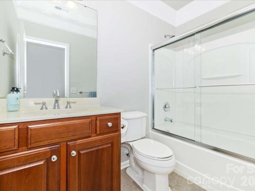 39653 Rosebay Court, Fort Mill, SC 29707.  MLS# CAR4380467, YatesRealty ID 24942. Lower Level Bath