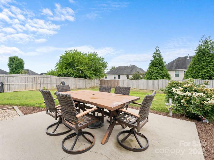 144 Haw River Road, Fletcher, NC 28732.  MLS# CAR4279865, YatesRealty ID 24943. Back patio