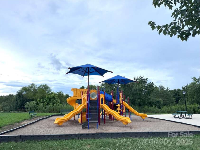 144 Haw River Road, Fletcher, NC 28732.  MLS# CAR4279865, YatesRealty ID 24943. Community playground