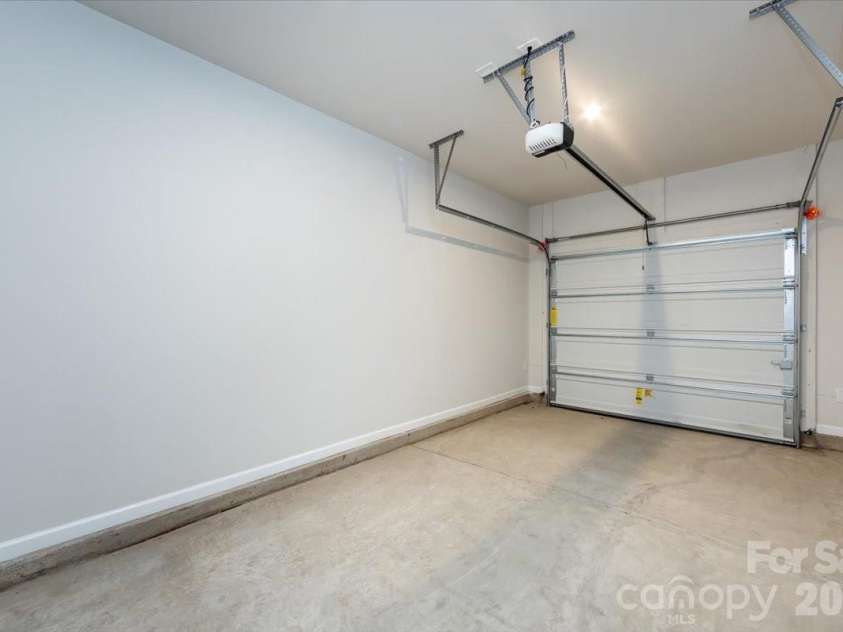 6017 Longar Lane, Charlotte, NC 28269.  MLS# CAR4356792, YatesRealty ID 24944. 1 Bay Garage