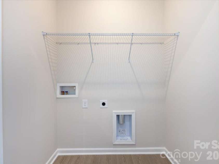 6017 Longar Lane, Charlotte, NC 28269.  MLS# CAR4356792, YatesRealty ID 24944. Laundry