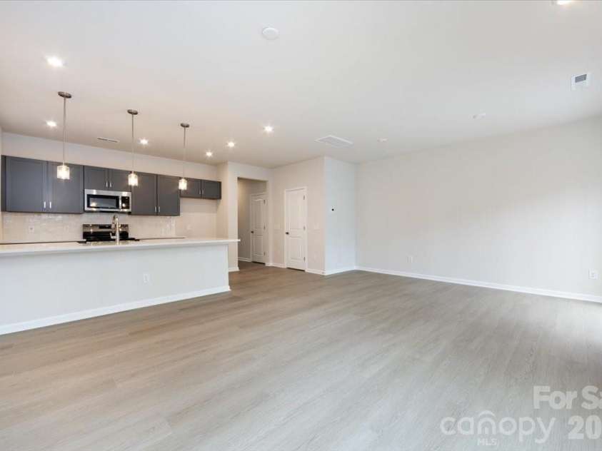 6017 Longar Lane, Charlotte, NC 28269.  MLS# CAR4356792, YatesRealty ID 24944. Open concept living