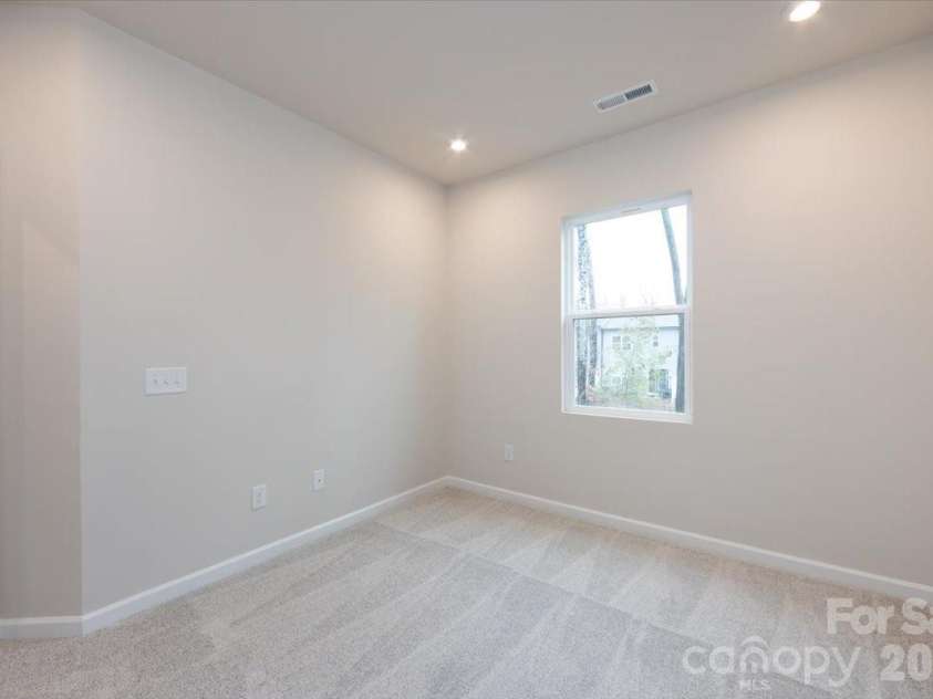 6017 Longar Lane, Charlotte, NC 28269.  MLS# CAR4356792, YatesRealty ID 24944. Secondary Bedroom