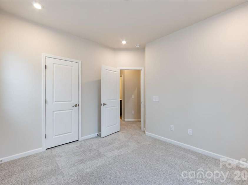 6017 Longar Lane, Charlotte, NC 28269.  MLS# CAR4356792, YatesRealty ID 24944. Secondary Bedroom