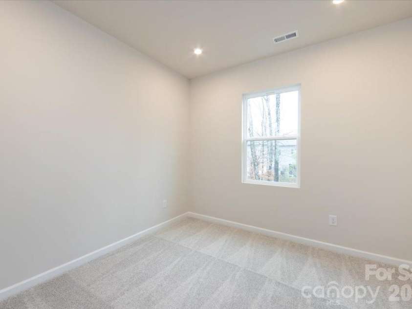 6017 Longar Lane, Charlotte, NC 28269.  MLS# CAR4356792, YatesRealty ID 24944. Third bedroom
