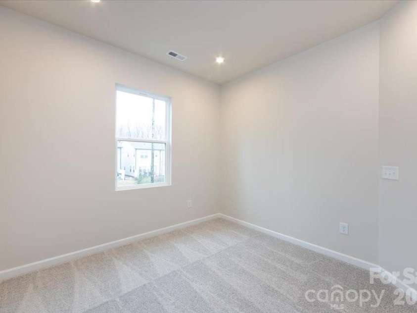 6017 Longar Lane, Charlotte, NC 28269.  MLS# CAR4356792, YatesRealty ID 24944. Third bedroom
