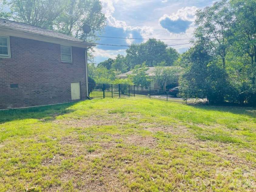 348 Random Drive, New London, NC 28127.  MLS# CAR4369268, YatesRealty ID 24946. Back-yard