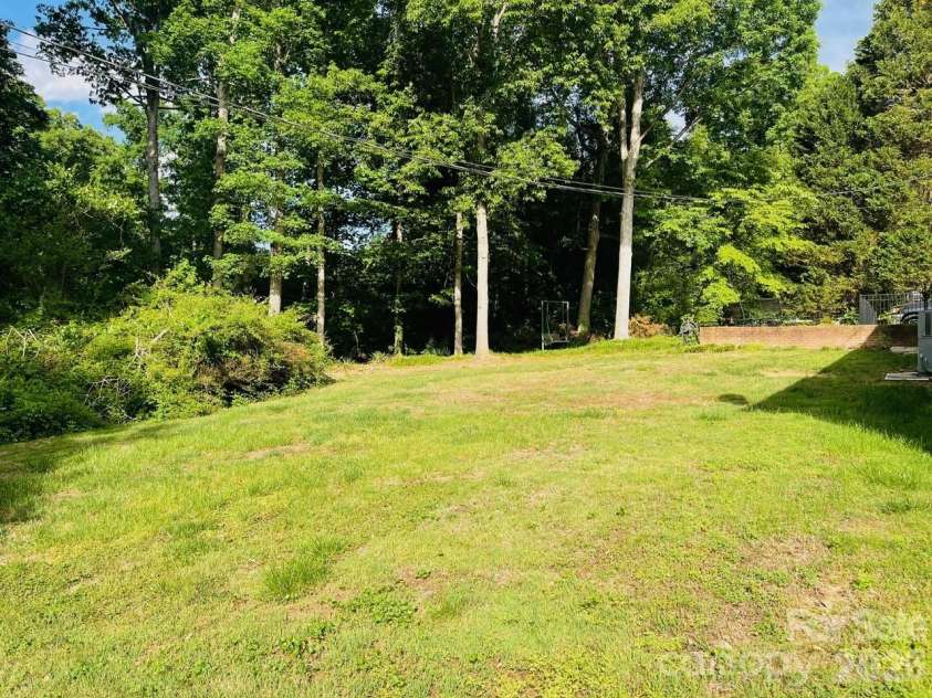 348 Random Drive, New London, NC 28127.  MLS# CAR4369268, YatesRealty ID 24946. Back-yard