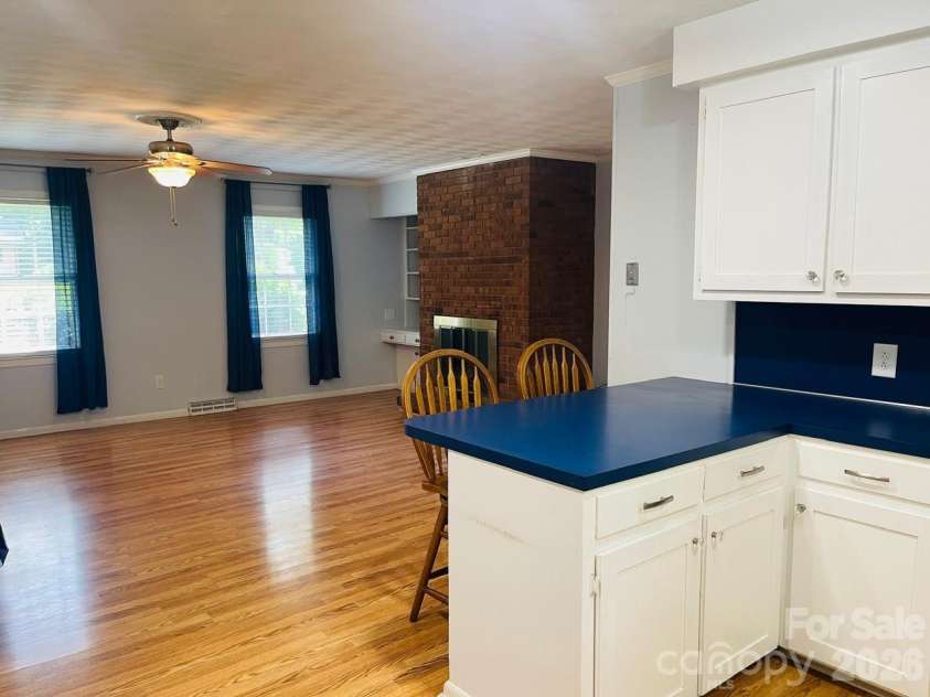 348 Random Drive, New London, NC 28127.  MLS# CAR4369268, YatesRealty ID 24946. Kitchen Overlooking Den