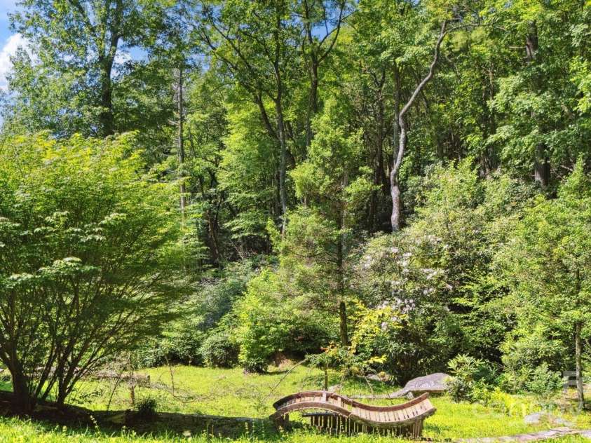 44 Rainbow Road, Highlands, NC 28741.  MLS# CAR4279105, YatesRealty ID 24947. Large Terraced Backyard