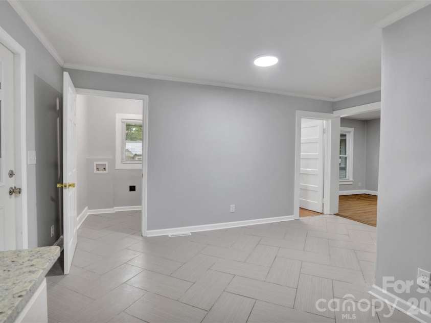 445 Peachtree Street, Albemarle, NC 28001.  MLS# CAR4385073, YatesRealty ID 24949. Laundry room off kitchen....