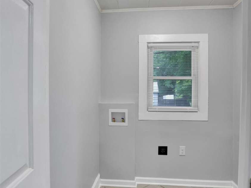 445 Peachtree Street, Albemarle, NC 28001.  MLS# CAR4385073, YatesRealty ID 24949. Spacious laundry room.... 