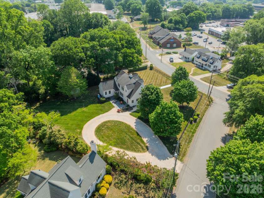 27 Circle Drive, Belmont, NC 28012.  MLS# CAR4337909, YatesRealty ID 2495. Large 0.75 acre flat lot fully fenced with gates