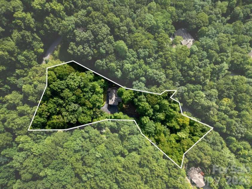 141 Bruce Circle, Pisgah Forest, NC 28768.  MLS# CAR4408833, YatesRealty ID 24950. 2.38 Wooded Private Acres
