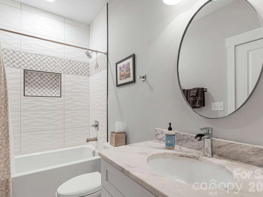365 Stone Cliff Lane, Clover, SC 29710.  MLS# CAR4365360, YatesRealty ID 24968. Secondary bathrooms also boast high end finishes and tile work