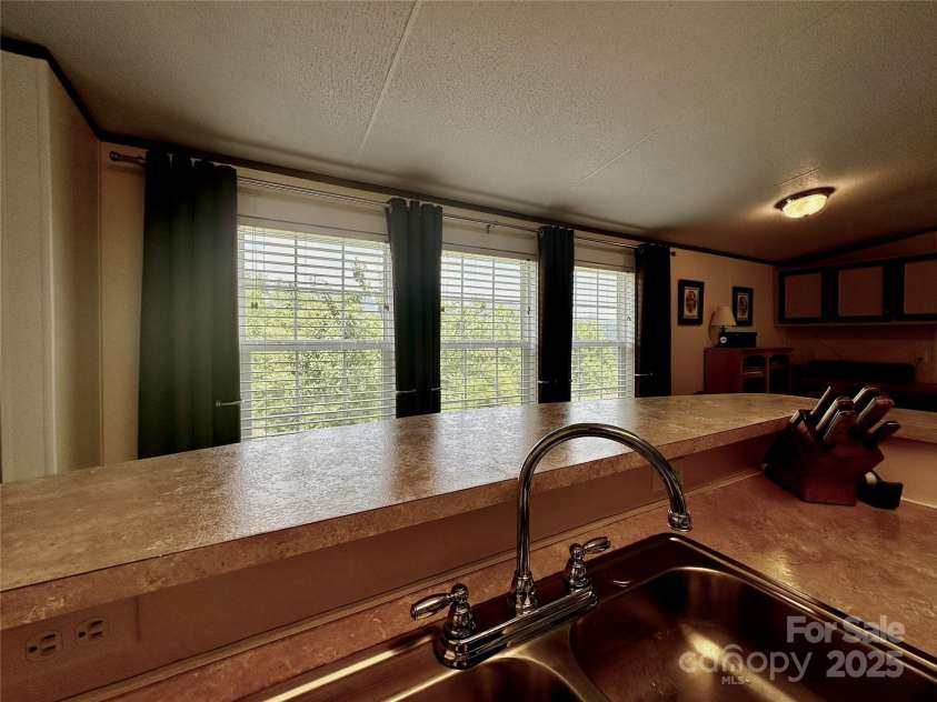 448 Hopson Heritage Lane, Burnsville, NC 28740.  MLS# CAR4275038, YatesRealty ID 24968. 