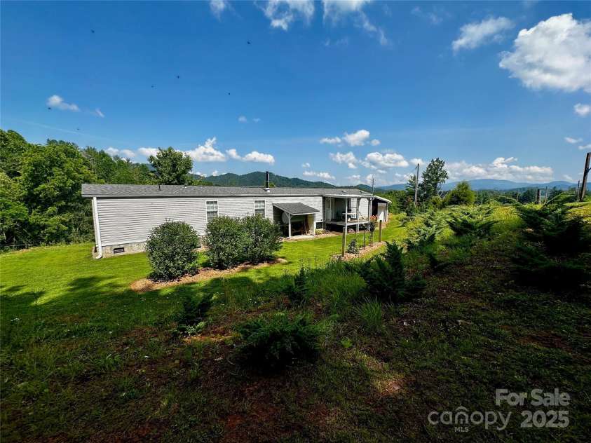 448 Hopson Heritage Lane, Burnsville, NC 28740.  MLS# CAR4275038, YatesRealty ID 24968. 