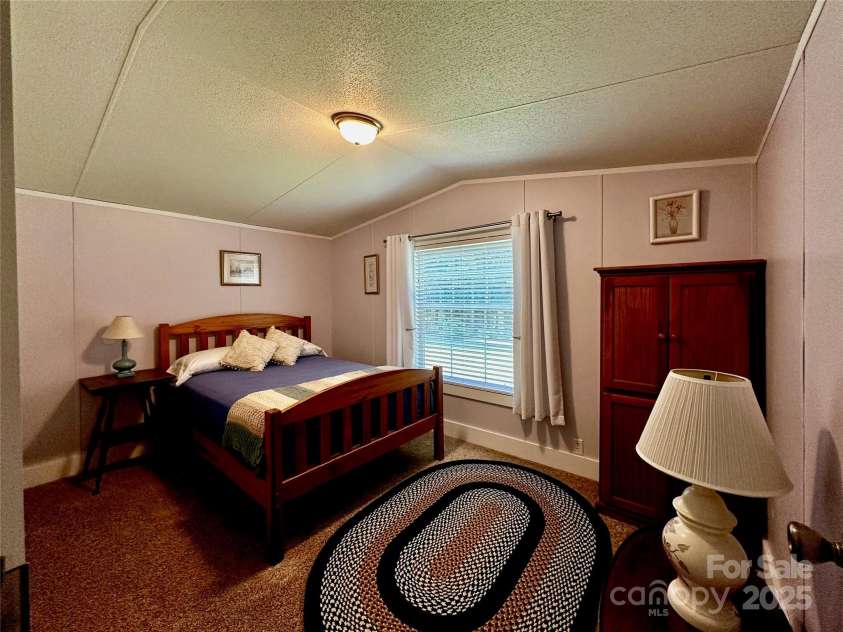 448 Hopson Heritage Lane, Burnsville, NC 28740.  MLS# CAR4275038, YatesRealty ID 24968. Guest Bedroom 1