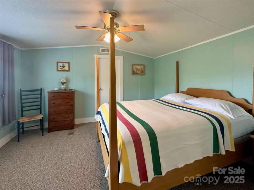 448 Hopson Heritage Lane, Burnsville, NC 28740.  MLS# CAR4275038, YatesRealty ID 24968. Master Bedroom